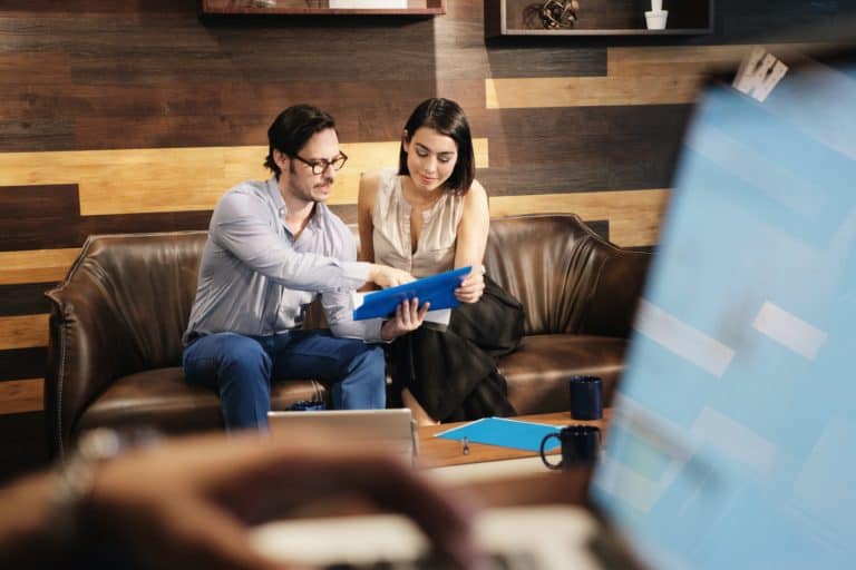 Business Man And Woman Meeting At Work In Office Cafeteria