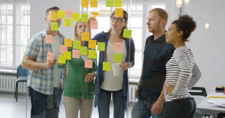 Colleagues working together in modern office